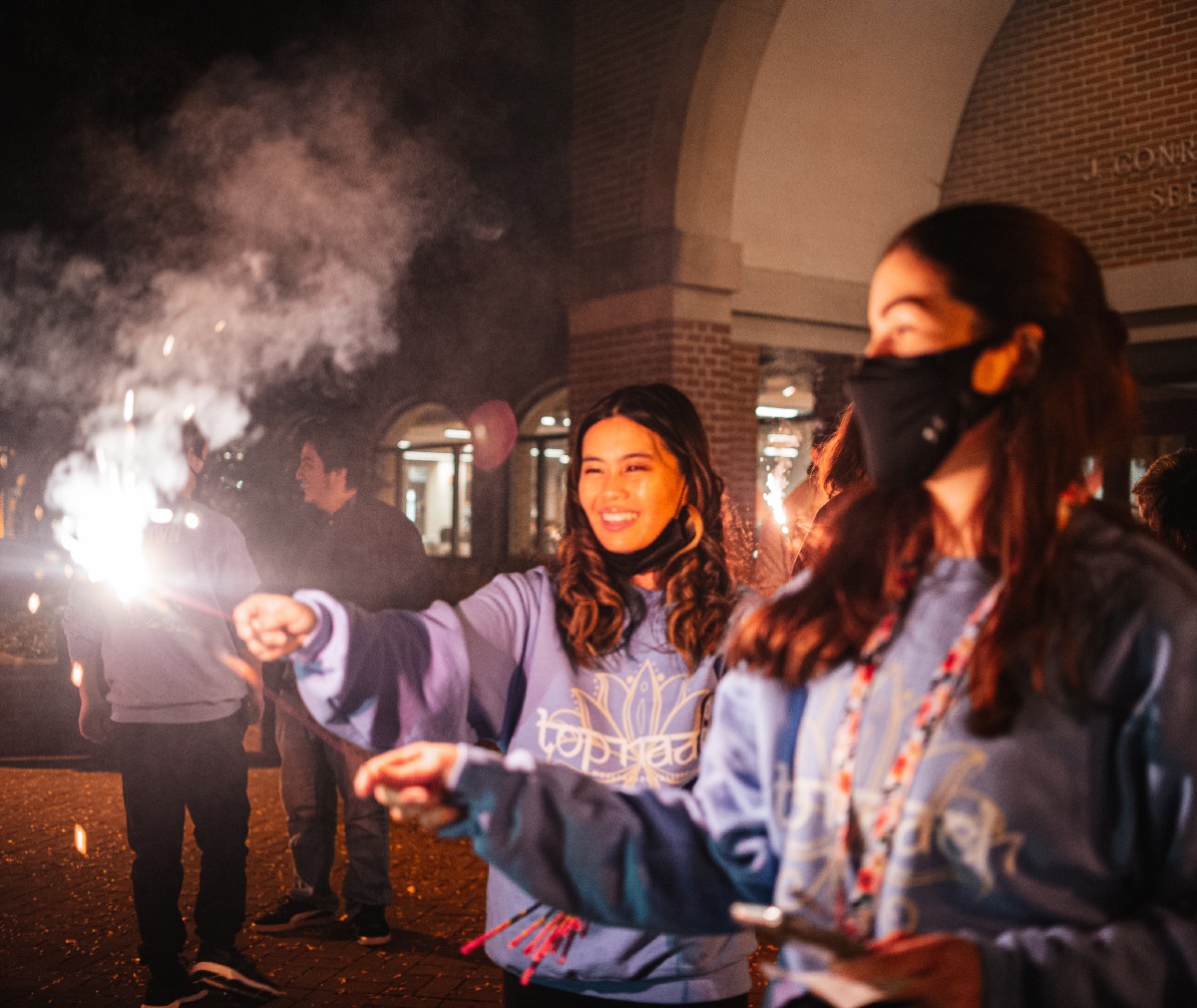 Students participate in a celebration for Diwali. 